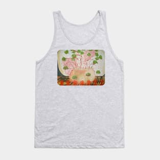 green flowers in a flower pot on a table. Tank Top